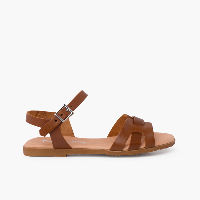 Sandalias niña y mujer pala romana piel Cuero