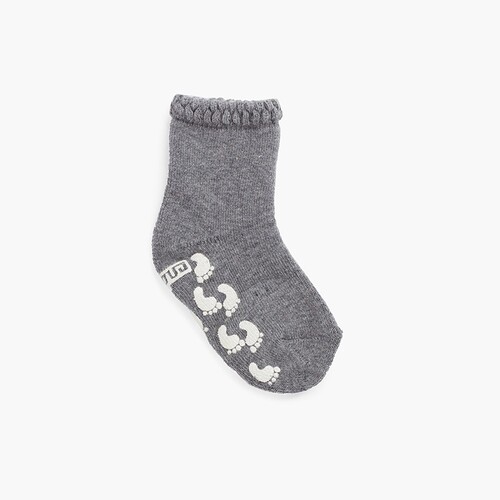 Calcetines antideslizantes huellas puño labrado  Gris