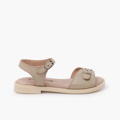 Sandalias niña en piel. Pala hebilla Arena