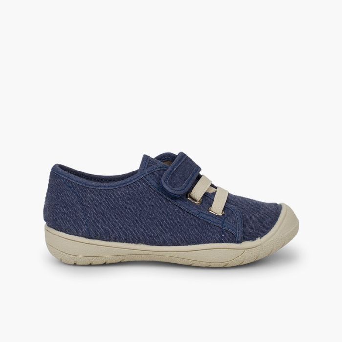 Zapatillas niños cierre tira adherente    y cordón elastico
