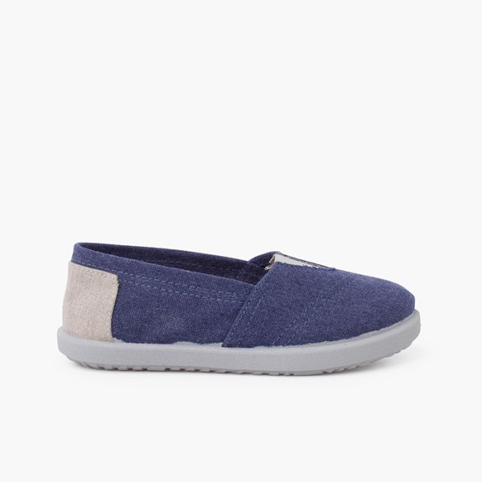Zapatillas lona elástico detalle talón