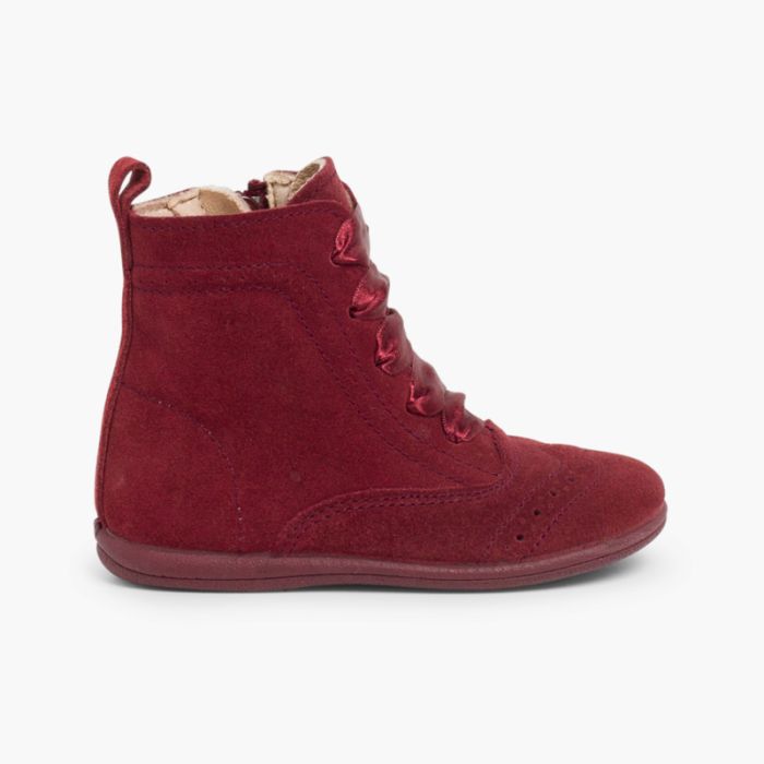 Botas pascualas con cremallera y lazo raso