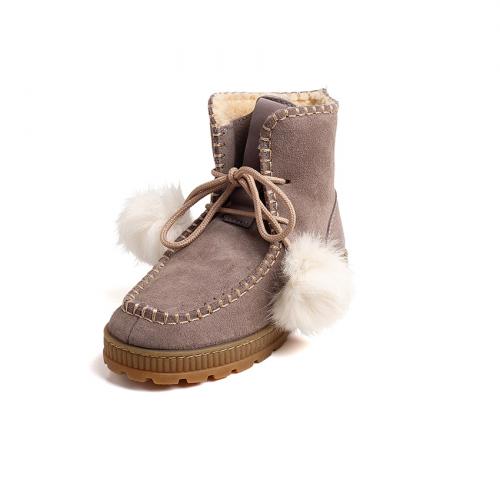 Botas niña de serraje y forro de pelo con pompones