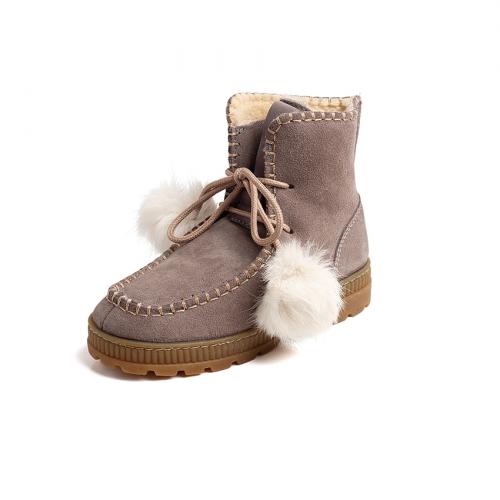 Botas niña de serraje y forro de pelo con pompones